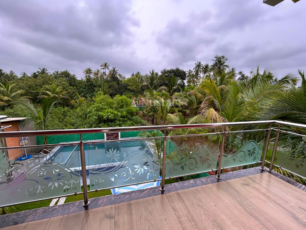 1st Floor Balcony Glass Railing View of Pool & Palms